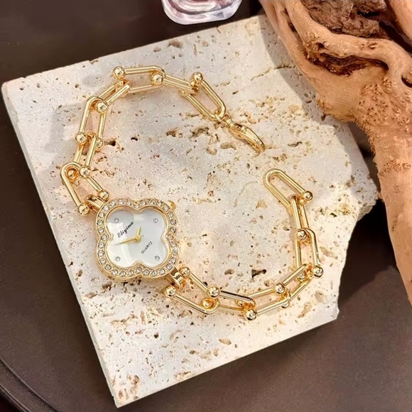Anthropologie Jewelry - Gold Crystal Clover Bracelet Watch